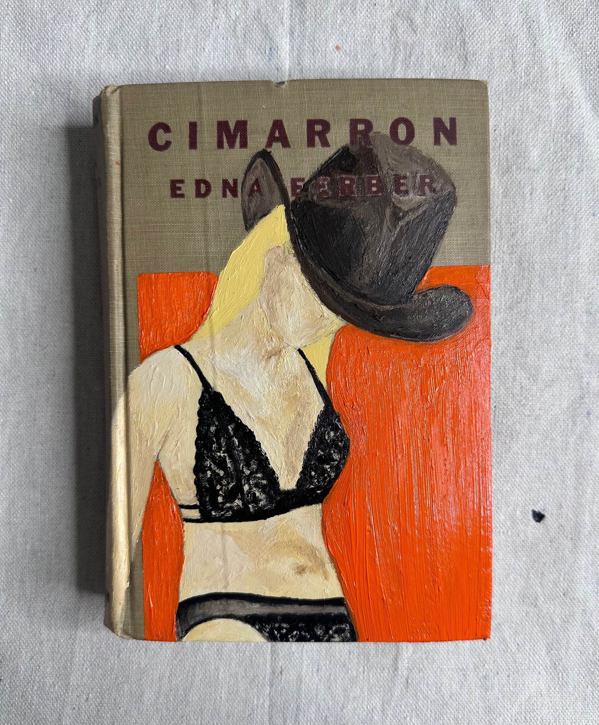 Book cover of 'Cimarron' by Edna Ferber with a stylized illustration on a textured background